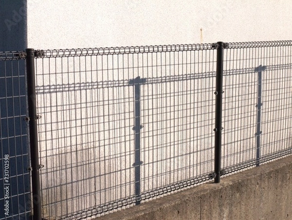 Obraz フェンスと影