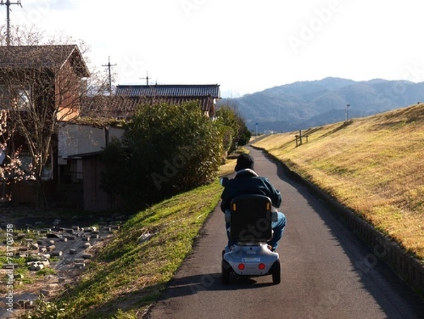 Obraz 乗り物に乗る老人