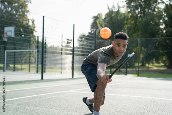 Fototapeta Man playing pickleball