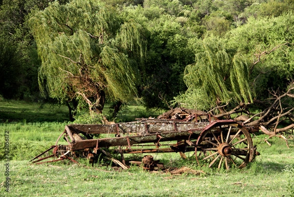Fototapeta An old ox-wagon that was left abandoned on a farm  in the Vredefort Dome area, North west, Sout Africa, 