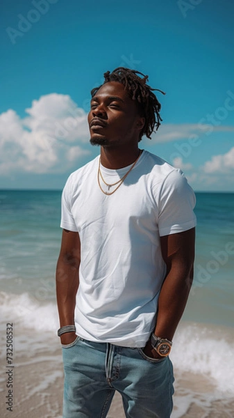 Fototapeta African man on background of sandy beach of the sea.