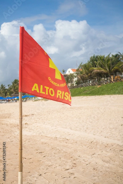 Fototapeta lifeguard risk flag on the beaches of Brazil, have more fun and be careful to make your vacation the best
