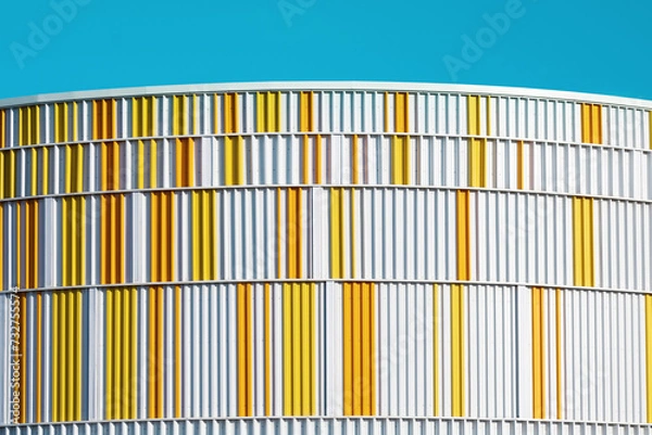 Obraz Modern architecture. Close up of blue and yellow building.