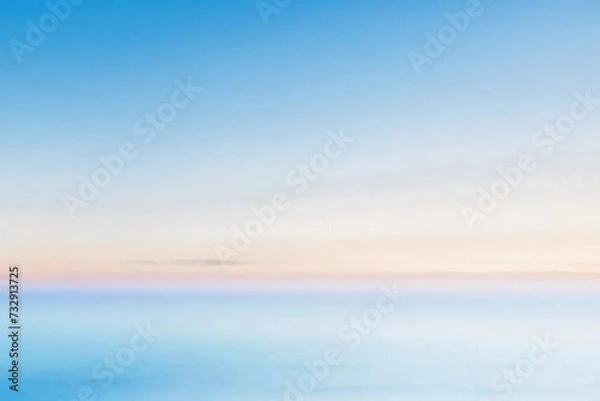 Fototapeta A stunning ash, blue and light blue gradient background that fades into a soft white, reminiscent of a dreamy sunset over the ocean