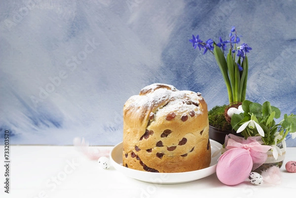 Obraz Easter background-easter cake Craffin  , easter egg and spring flowers, blue background. Easter banner