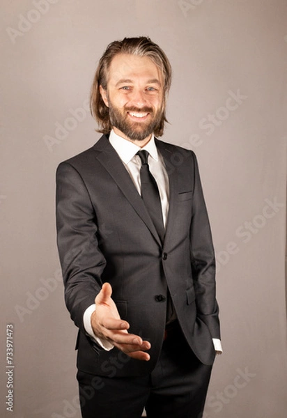 Obraz Businessman extending hand