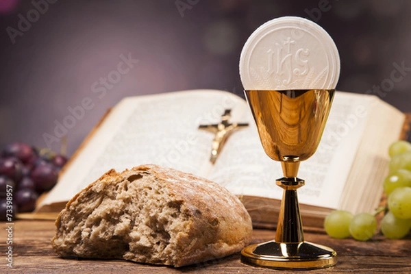 Obraz Sacred objects, bible, bread and wine.