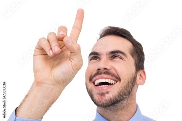 Obraz Happy businessman pointing something up