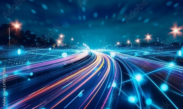 Fototapeta Night traffic light lines of cars in motion on a city highway with technology light effect with background blur