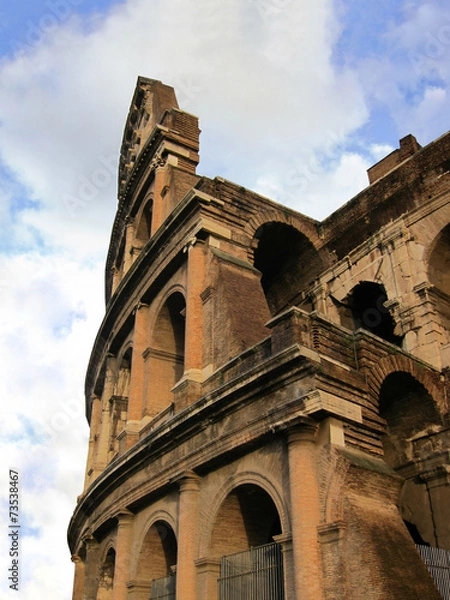 Fototapeta Колизей на фоне облачного неба