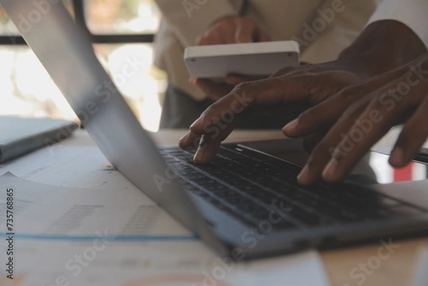 Fototapeta Finance manager meeting discussing company growth project success financial statistics, professional investor working start up project for strategy plan with document, laptop and digital tablet.