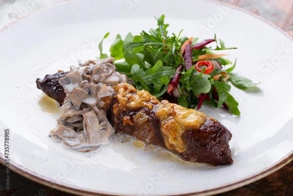 Fototapeta Grilled lamb chops with vegetables, served with herbs on white plate for restaurant menu