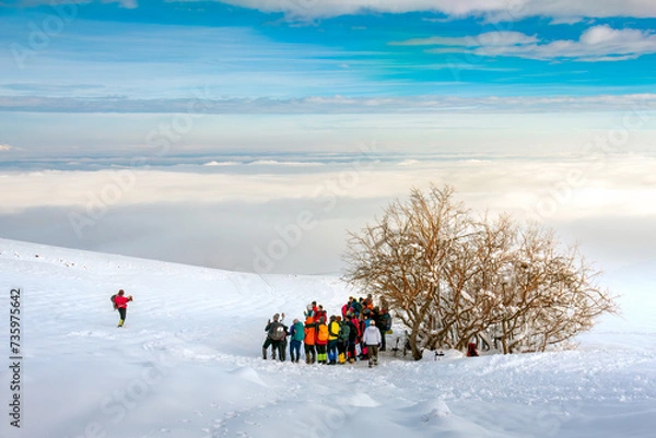 Obraz Mountaineers taking a group photo