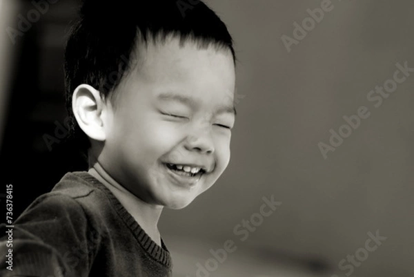 Fototapeta Happy  young boys playing hide and seek ,monochromatic tone and copy space
