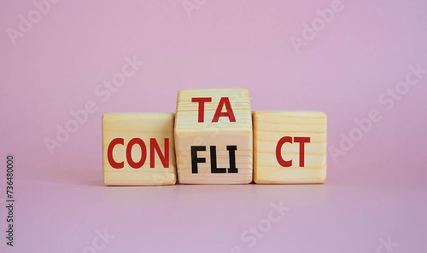 Fototapeta Contact and Conflict symbol. Wooden cubes with words Contact and Conflict. Beautiful pink background. Contact and Conflict and business concept. Copy space