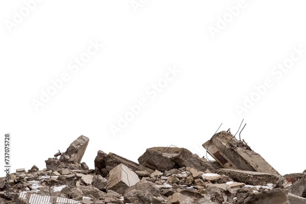 Fototapeta A pile of large gray concrete debris with protruding fittings and the remnants of snow isolated on a white background. Remnants of the destruction of a large concrete building. Background