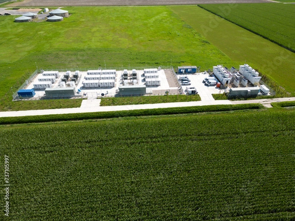 Fototapeta Batteries for energy storage supplying and stabilizing a larger amount of renewable energy to the electric grid, Flevopolder, The Netherlands