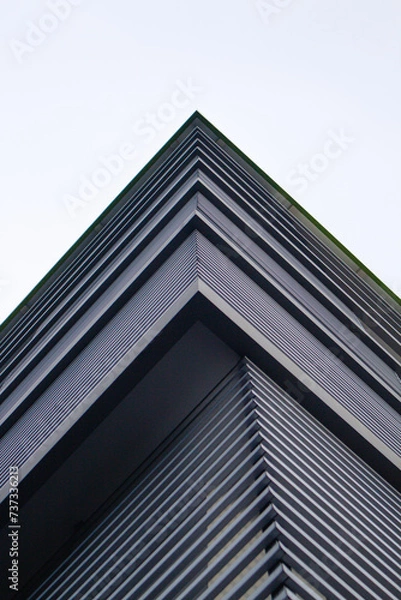 Fototapeta modern building details geometric and abstract architectural concepts with low angle.