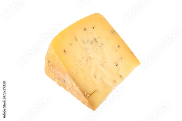 Fototapeta triangular piece of cheese with herbs isolated on a white backgr