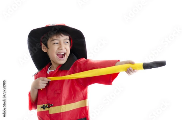Fototapeta Little boy pretend as a fire fighter on white background