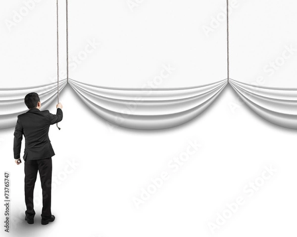 Obraz businessman pulling open blank curtain with empty behind