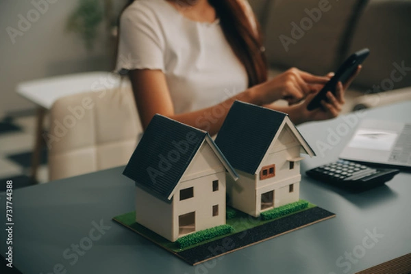 Fototapeta real estate agent Delivering sample homes to customers, mortgage loan contracts. Make a contract for hire purchase and sale of a house. and home insurance contracts, home mortgage loan concepts