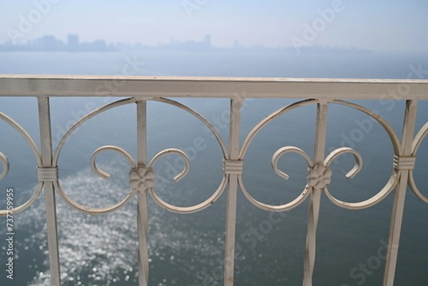 Obraz wrought iron railing outside the window 