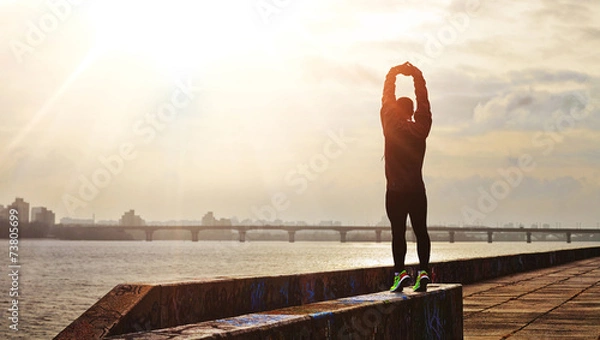 Fototapeta Runner in the sunlight