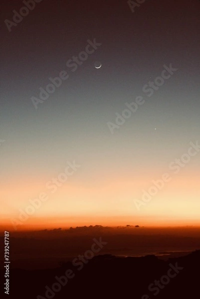Obraz sunset and moon over mountains