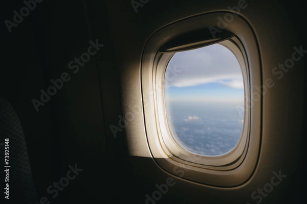 Obraz Airplane window with sunlight