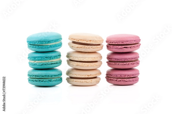 Fototapeta Three stackes of multicolored macaroons isolated