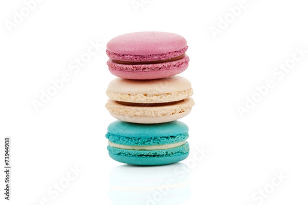 Fototapeta Three multicolored stacked macaroons isolated