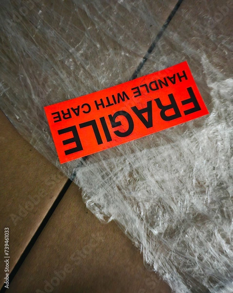 Obraz Moving boxes with fragile sticker on a background