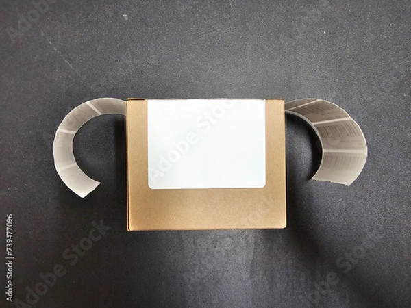 Obraz Labeled Shipping Box. Black background