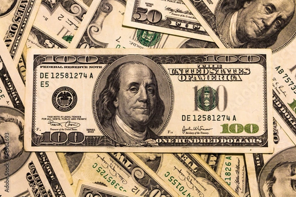 Fototapeta Background with american dollar bills different banknotes