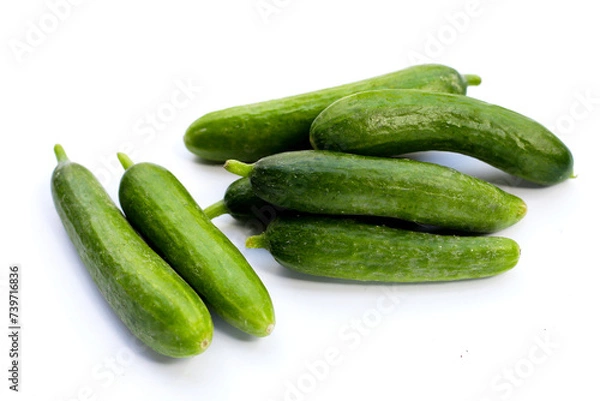 Fototapeta Mini cucumbers on white background.