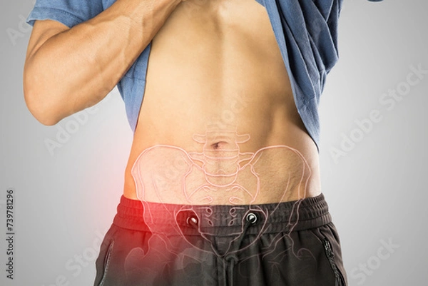 Fototapeta A man has pelvic problem.