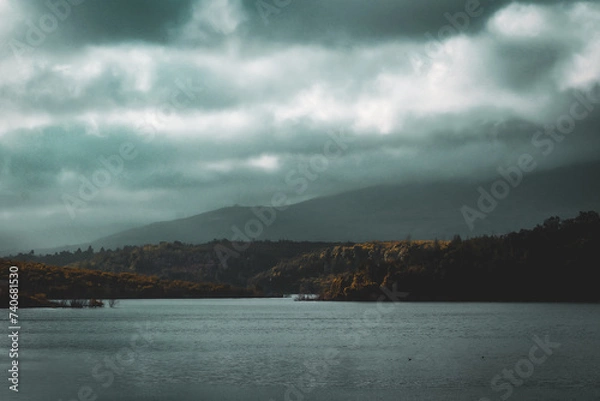 Obraz Wind stirs the lake under a dark sky