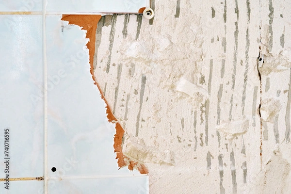 Fototapeta Fliesen Reste an einer Wand in einem Altbau. 