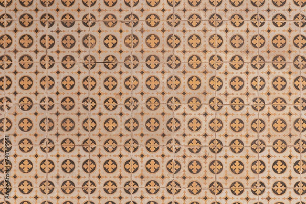 Obraz Typical Lisbon facade with its vintage geometrical tiles in Portugal. 