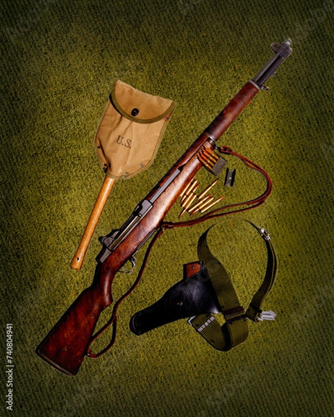 Obraz On 6 June 1944, the Allies launched D-Day to liberate the world from the scourge of Nazism. The M-1 Garand, M-1911, and entrenching tool were all equipment carried by soldiers of the day.