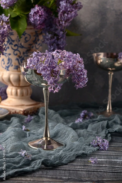 Fototapeta Spring background with lilac bouquets