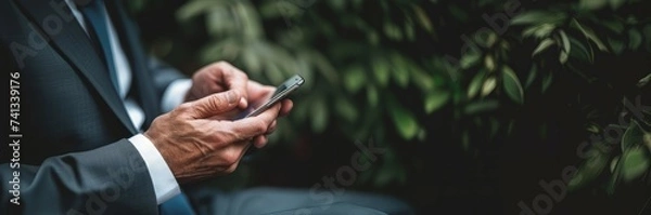 Fototapeta Close up hands of businessman is typing text messages on mobile phone, Male using his smartphone . generative ai