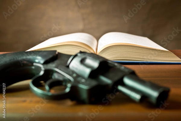 Obraz open book with handgun