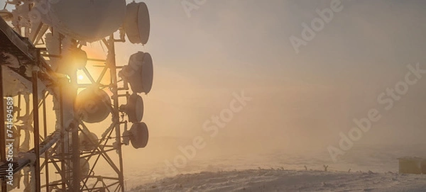 Obraz telecommunication pole at dawn	