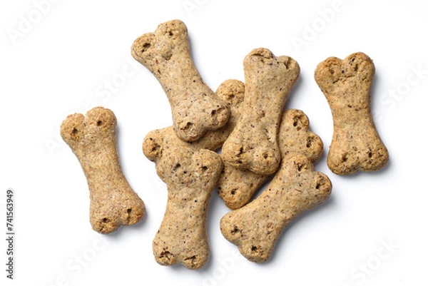 Fototapeta Top view of group of crunchy bone shaped dog biscuit set isolated on white background
