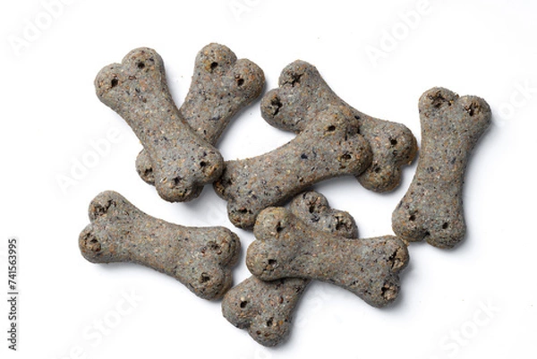 Fototapeta Top view of group of crunchy bone shaped dog biscuit set isolated on white background