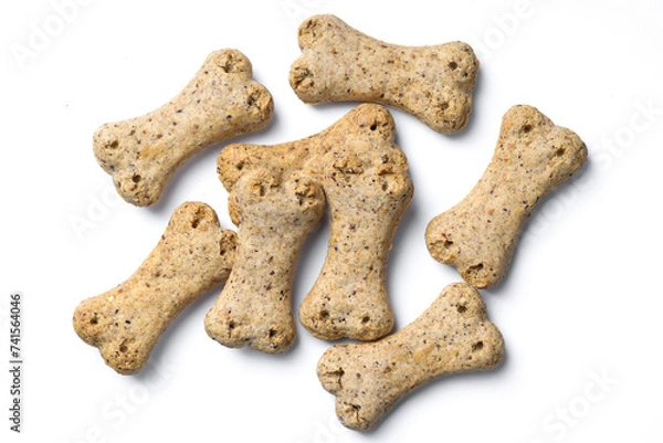 Fototapeta Top view of group of crunchy bone shaped dog biscuit set isolated on white background