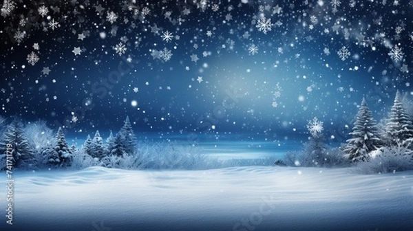 Fototapeta A winter wonderland of snow-covered trees and a frozen lake at night