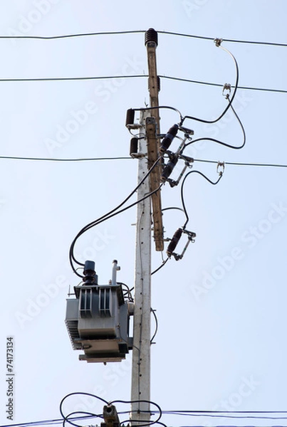 Fototapeta Distribution transformert on the concrete pole and wires.